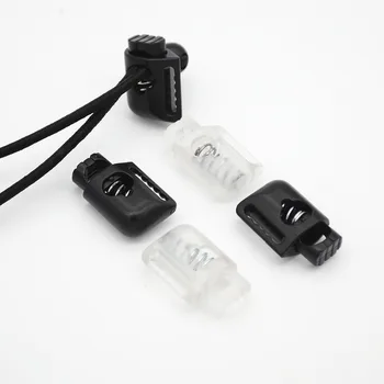 100 шт./лот, черный прозрачный АБС-пластик, защелкивающийся шнуровой замок с пружинными переключателями, пластиковые пробки, пряжка для шнура, хлеб из черной нити.